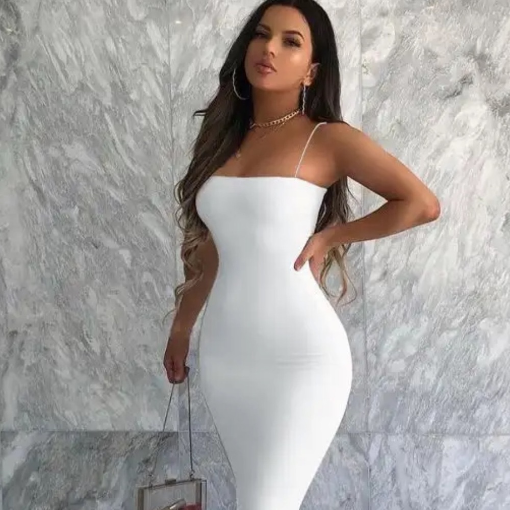 White dress in size small to medium 4-6 brand new